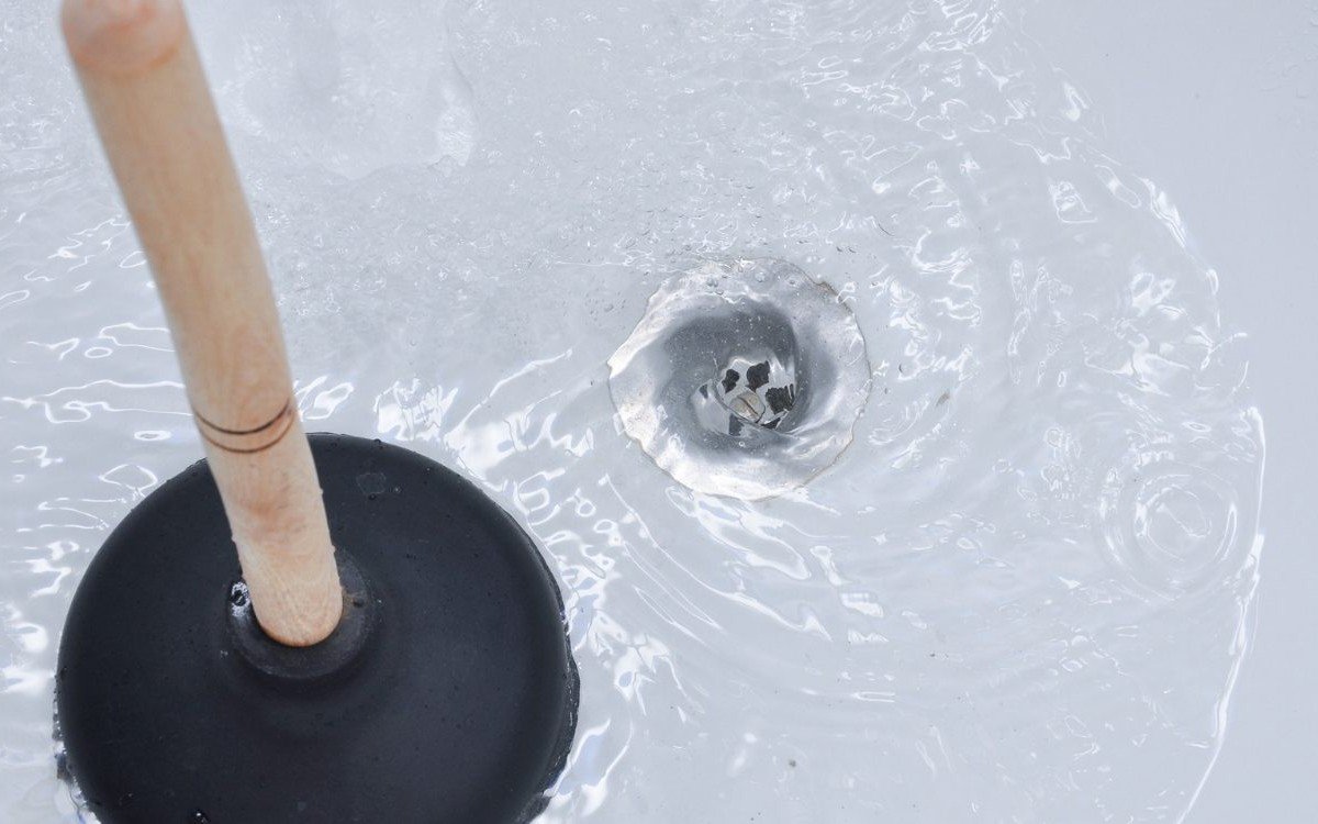 unclog a sink with a plunger
