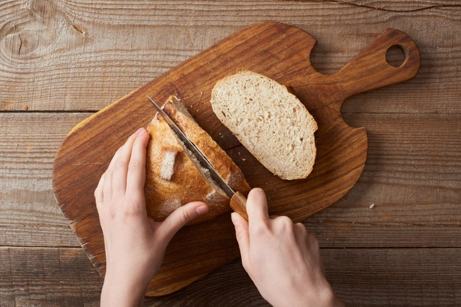 slicing fresh bread