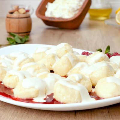 curd gnocchi with berry sauce