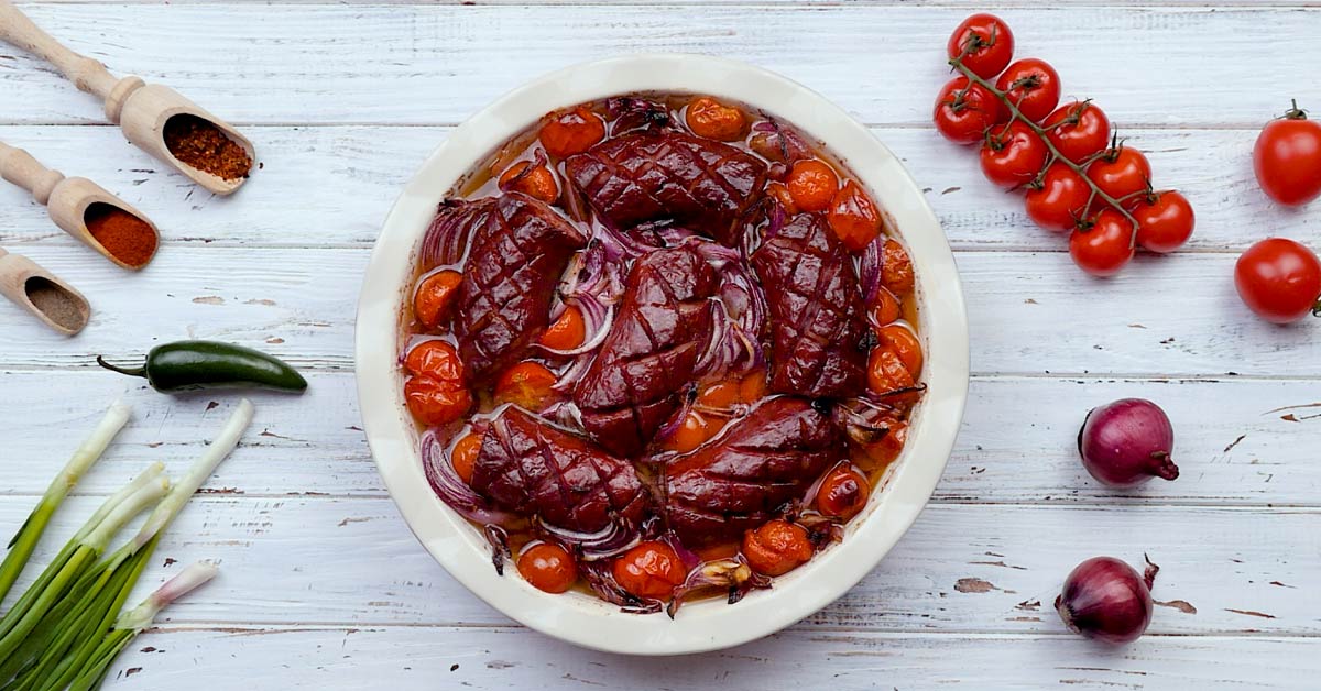 Beer-Braised Sausages With Onions